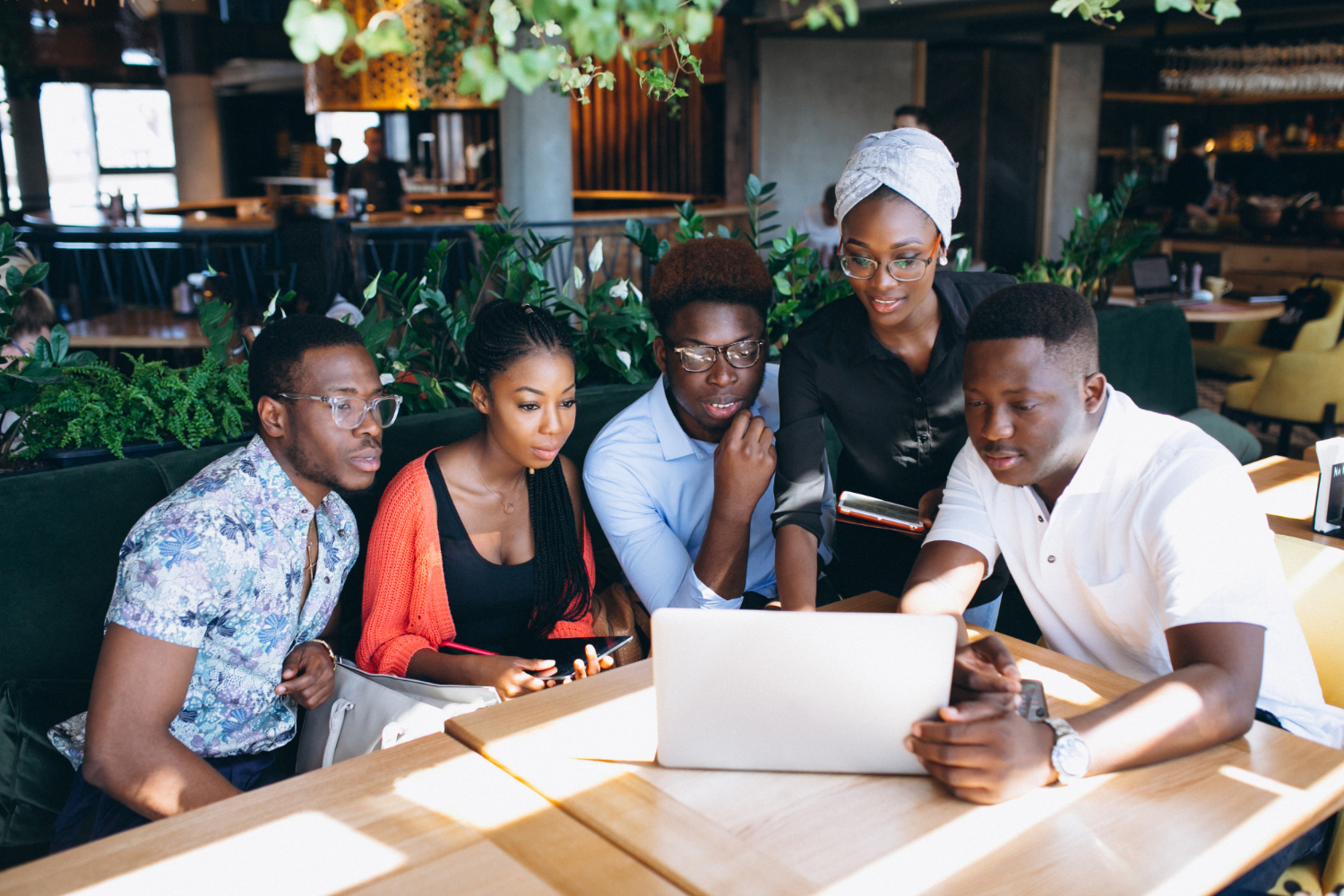 Afriment interns collaborating on a real project brief